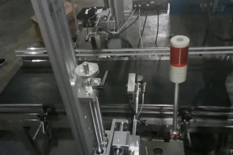 压电式高解析喷码机在生产线上的喷头与输送机构